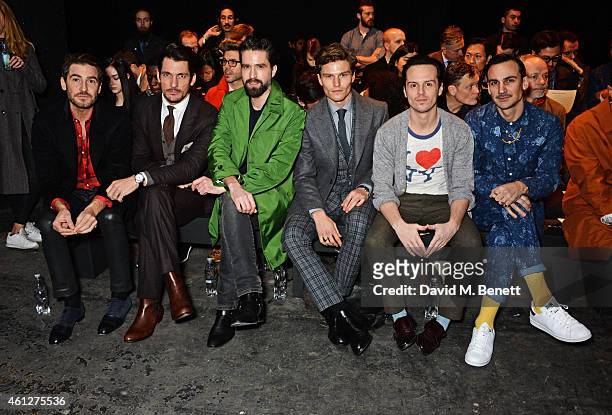 Robert Konjic, David Gandy, Jack Guinness, Oliver Cheshire, Andrew Scott and Henry Lloyd-Hughes attend the front row at the Oliver Spencer show...