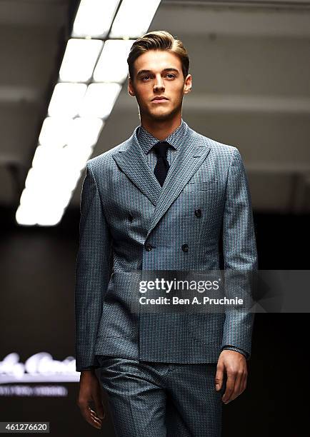 Model walks the runway during the Hardy Amies show at the London Collections: Men AW15 at on January 10, 2015 in London, England.