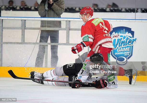 Andreas Holmqvist of the Koelner Haien and Alexander Preibisch of the Duesseldorfer EG in action during the game between the Legenden of the...