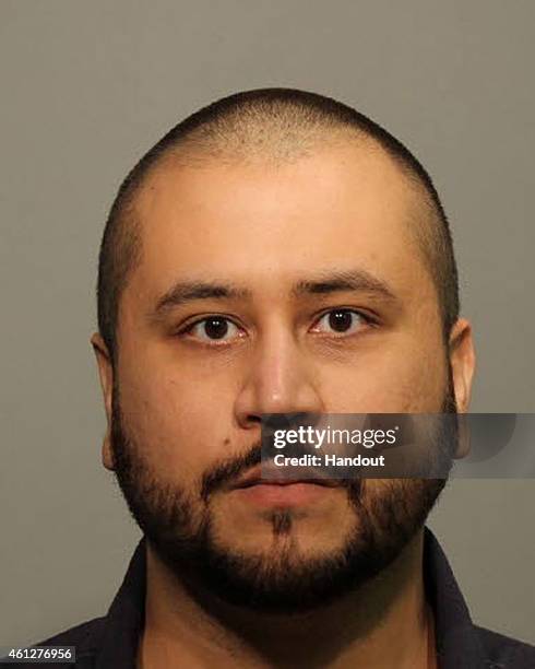 In this handout photo provided by Seminole County Sheriff`s Office, George Zimmerman poses for a mug shot photo after being arrested and booked into...