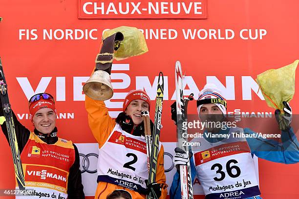Eric Frenzel of Germany takes 1st place, Fabian Riessle of Germany takes 2nd place, Magnus Hovdal Moan of Norway takes 3rd place during the FIS...