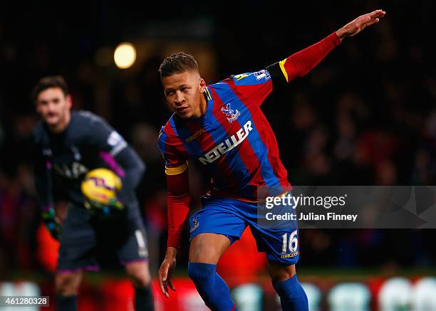 Despair for Hugo Lloris of Spurs as Dwight Gayle of Crystal Palace celebrates scoring their first and equalisin goal from a penalty during the...