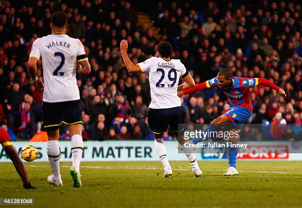 Jason Puncheon of Crystal Palace beats Etienne Capoue of Spurs to score their second goal during the Barclays Premier League match between Crystal...