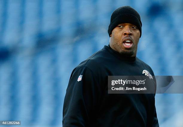 Terrell Suggs of the Baltimore Ravens warms up before the 2014 AFC Divisional Playoffs game against the New England Patriots at Gillette Stadium on...