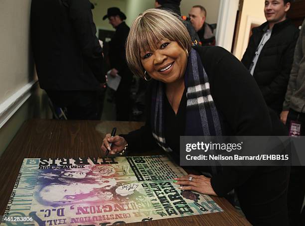 Mavis Staples signs autographs backstage prior to The Life & Songs of Emmylou Harris: An All Star Concert Celebration at DAR Constitution Hall on...