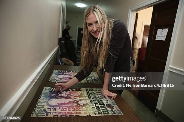 Holly Williams signs autographs backstage prior to The Life & Songs of Emmylou Harris: An All Star Concert Celebration at DAR Constitution Hall on...