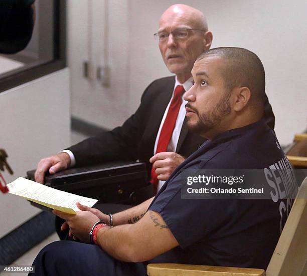 George Zimmerman, right, sits with attorney Don West during a first appearance at the Seminole County Courthouse in Sanford, Fla., on Saturday, Jan....
