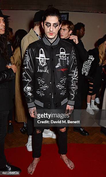 Model poses as Harvey Nichols and Dazed present the Haculla x Trapstar presentation during London Collections: Men AW15 at Central Saint Martins on...