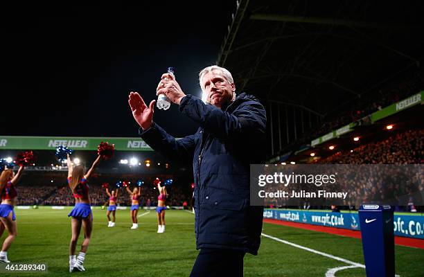 Alan Pardew, manager of Crystal Palace arrives for his first home game in charge during the Barclays Premier League match between Crystal Palace and...