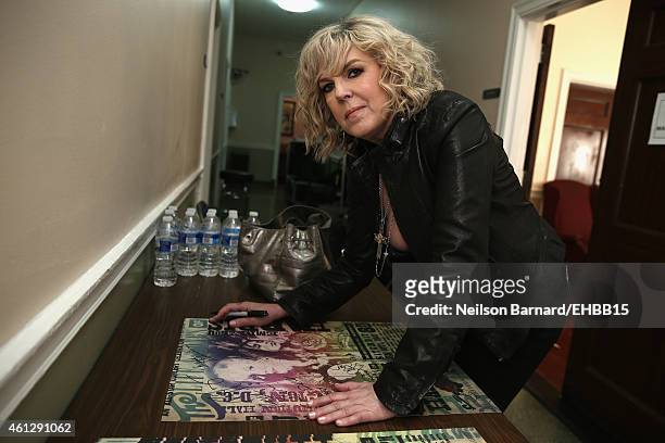 Lucinda Williams poses backstage at The Life & Songs of Emmylou Harris: An All Star Concert Celebration at DAR Constitution Hall on January 10, 2015...