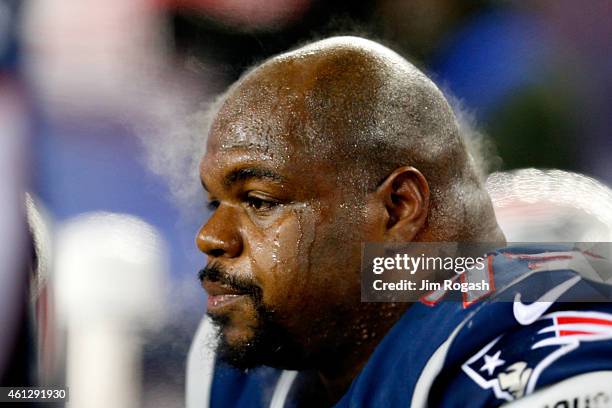 Steam rises from the head of Vince Wilfork of the New England Patriots in the first half against the Baltimore Ravens during the 2014 AFC Divisional...