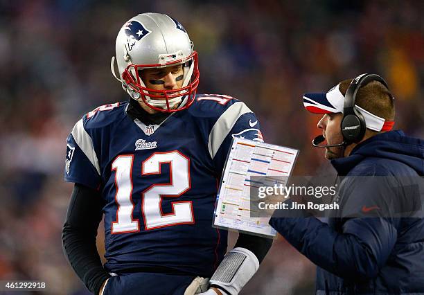 Tom Brady of the New England Patriots looks on in the first half against the Baltimore Ravens during the 2014 AFC Divisional Playoffs game at...