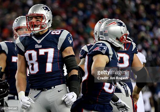 Rob Gronkowski of the New England Patriots reacts after scoring a touchdown during the third quarter of the 2015 AFC Divisional Playoffs game against...