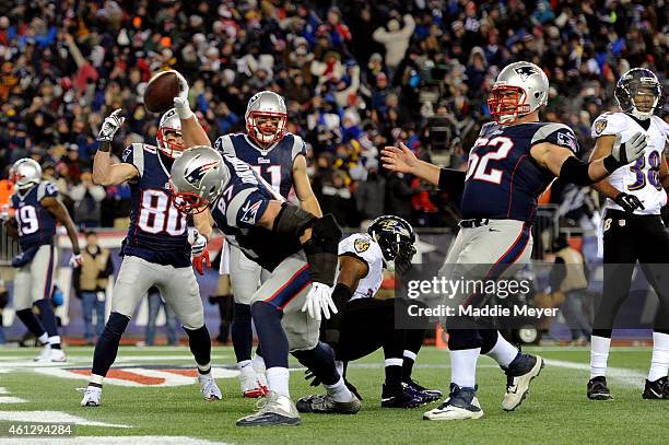 Rob Gronkowski of the New England Patriots celebrates after scoring a touchdown in the third quarter against the Baltimore Ravens during the 2015 AFC...