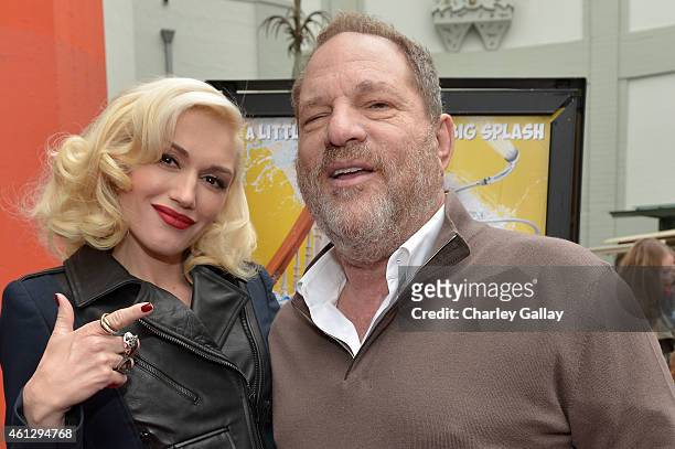 Singer Gwen Stefani and producer Harvey Weinstein arrive on the red carpet for the premiere of TWC-Dimension's "Paddington" at TCL Chinese Theatre...