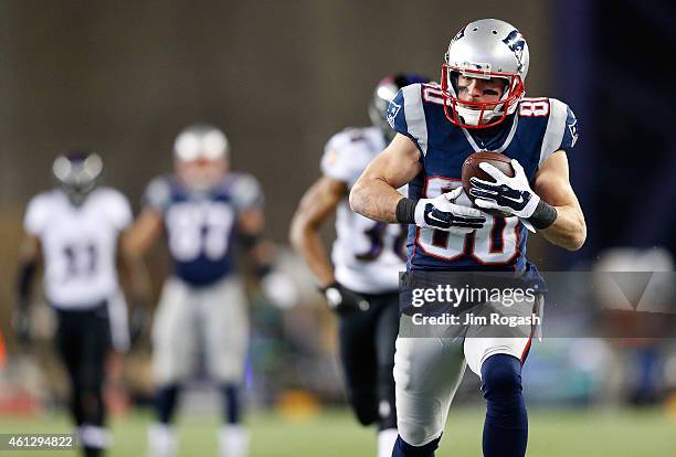 Danny Amendola of the New England Patriots scores a touchdown in the third quarter against the Baltimore Ravens during the 2015 AFC Divisional...