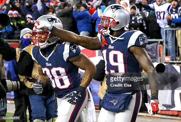 Brandon LaFell of the New England Patriots reacts alongside Brandon Bolden after catching a touchdown pass during the fourth quarter of the 2015 AFC...