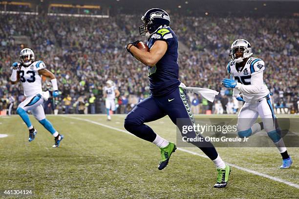 Jermaine Kearse of the Seattle Seahawks scores a 63 yard touchdown in the second quarter against the Carolina Panthers during the 2015 NFC Divisional...