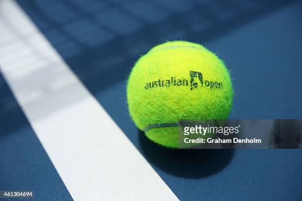 An Australian Open branded tennis ball is seen on court ahead of the 2015 Australian Open at Melbourne Park on January 11, 2015 in Melbourne,...