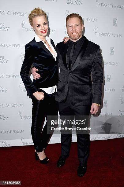 Model Jessica Roffey and founder and CEO of Relativity Media Ryan Kavanaugh attend The Art of Elysium 8th Annual Heaven Gala at Hangar 8 on January...