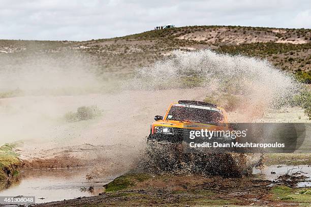 Robby Gordon and Johnny Campbell of the USA driving for Speed Energy Racing HST Hummer compete during day 7 of the Dakar Rallly between Iquique in...