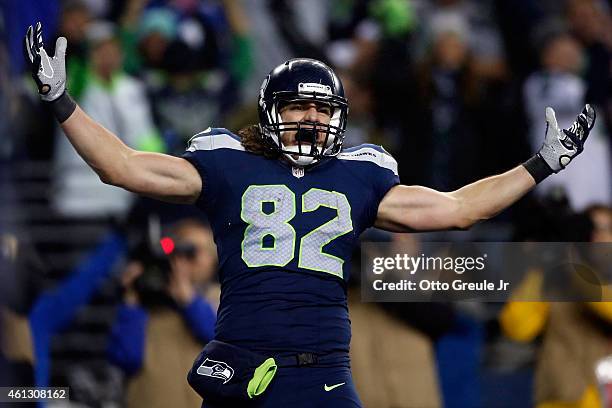 Luke Willson of the Seattle Seahawks celebrates after scoring a 25 yard touchdown in the fourth quarter against the Carolina Panthers during the 2015...