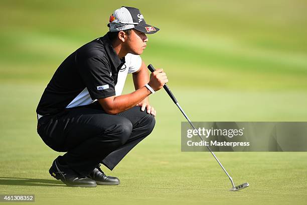 Hideki Matsuyama of Japan plays a putt on the 17th hole during the round one of the Hyundai Tournament of Champions at Plantation Course at Kapalua...