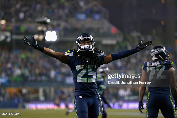 Richard Sherman of the Seattle Seahawks reacts after a play against the Carolina Panthers during the 2015 NFC Divisional Playoff game at CenturyLink...