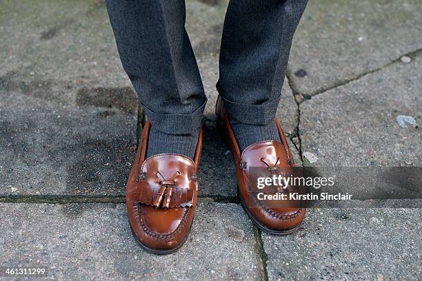 Fashion writer Billy Webb wears G.H Bass shoes, Top Man trousers day 1 of London Mens Fashion Week Autumn/Winter 2014, on January 06, 2014 in London,...
