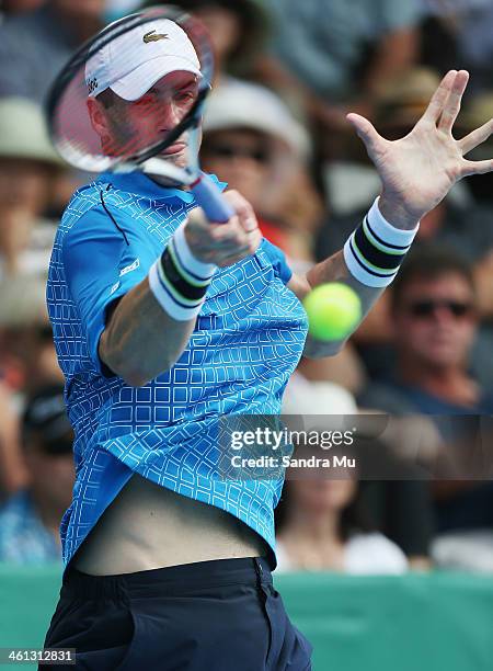 John Isner of USA plays a forehand during his match against Lukas Lacko of Slovakia on day three of the Heineken Open at ASB Tennis Centre on January...