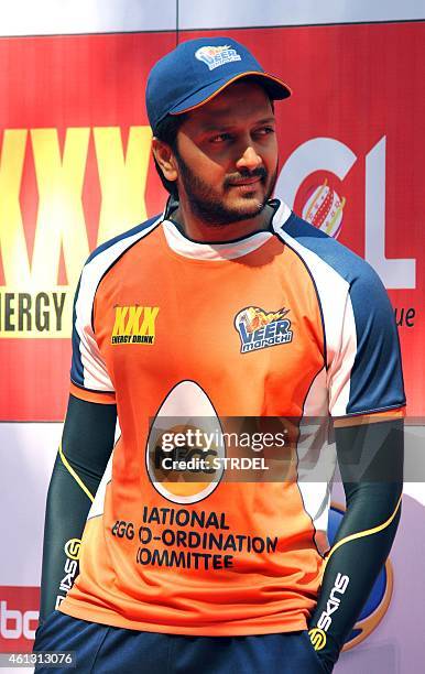 Indian Bollywood actor Ritesh Deshmukh poses for a photograph during the Celebrity Cricket League season five in Mumbai on January 10, 2015. AFP...