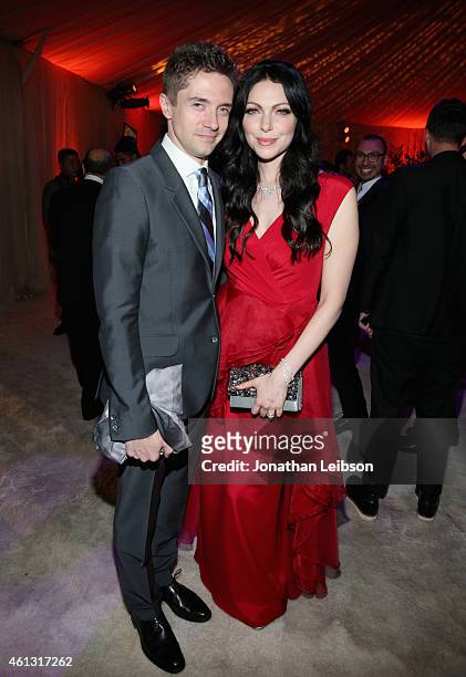 Actors Topher Grace and Laura Prepon attend the 8th Annual HEAVEN Gala presented by Art of Elysium and Samsung Galaxy at Hangar 8 on January 10, 2015...