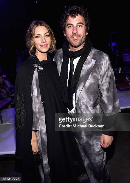 Actress Dawn Olivieri and guest attend the 8th Annual HEAVEN Gala presented by Art of Elysium and Samsung Galaxy at Hangar 8 on January 10, 2015 in...