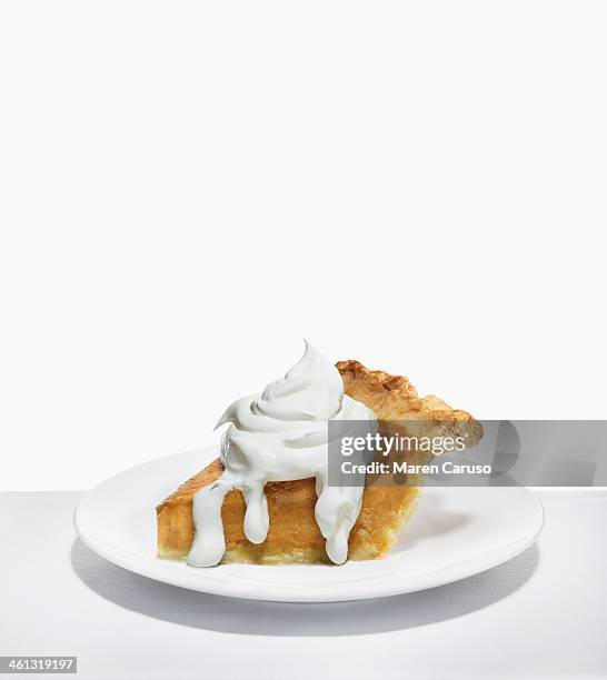 slice of pumpkin pie and whipped cream - cake slices imagens e fotografias de stock