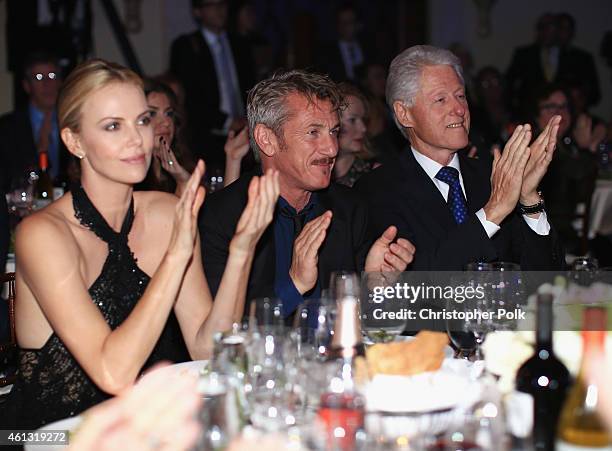 Charlize Theron, Founder and CEO of J/P Haitian Relief Organization Sean Penn and Former President of the United States Bill Clinton attend the 4th...