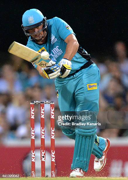 Peter Forrest of the Heat bats during the Big Bash League match between the Brisbane Heat and Sydney Sixers at The Gabba on January 11, 2015 in...