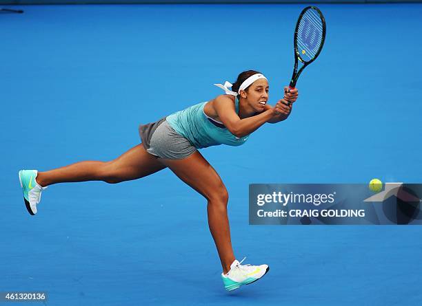 Madison Keys of the US defeats Svetlana Kuznetsova of Russia on day one of the Sydney International tennis tournament in Sydney on January 11, 2015....