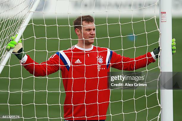 Goalkeeper Manuel Neuer looks on during day 3 of the Bayern Muenchen training camp at ASPIRE Academy for Sports Excellence on January 11, 2015 in...