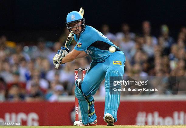 Peter Forrest of the Heat bats during the Big Bash League match between the Brisbane Heat and Sydney Sixers at The Gabba on January 11, 2015 in...