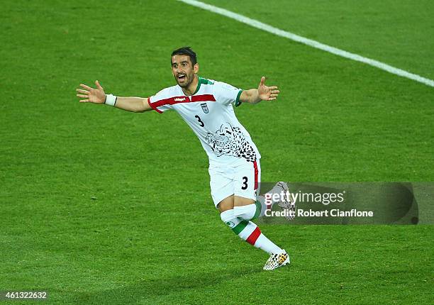 Ehsan Haji Safi of Iran celebrates after he scored the opening goal during the 2015 Asian Cup match between IR Iran and Bahrain at AAMI Park on...