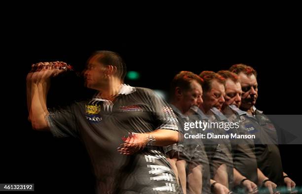 David Platt of Australia in action during the match against Mark McGrath of New Zealand at the Darts King Australasia tournament on January 11, 2015...