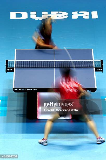 Liu Shiwen of China in action against Mi Gyong Ri North Korea during the Women's Final of the 2015 ITTF World Team Cup at Al Nasr Sports Stadium on...