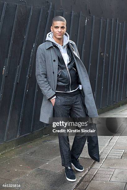 Model Zakaria Khiare wearing a Soulland coat and trousers, Nike trainers and a Woodward jacket on day 2 of London Collections: Men on January 10,...