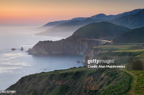 rugged coastal headlands of big sur california - bixby bridge stock pictures, royalty-free photos & images