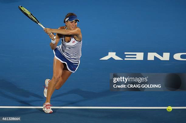 Belinda Bencic of Switzerland plays a forehand against Daria Gavrilova of Russia on day one of the Sydney International tennis tournament in Sydney...