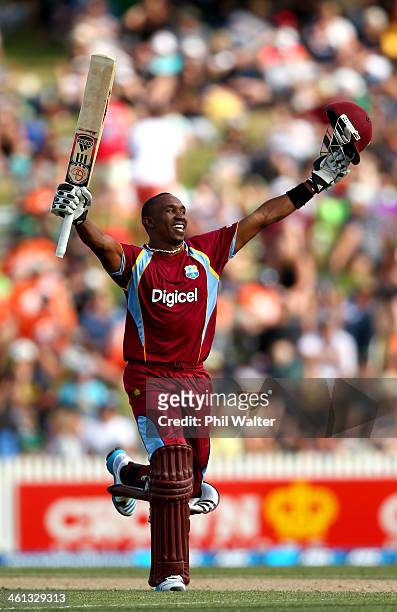 Dwayne Bravo of the West Indies celebrates his century during game five of the One Day International Series between New Zealand and the West Indies...