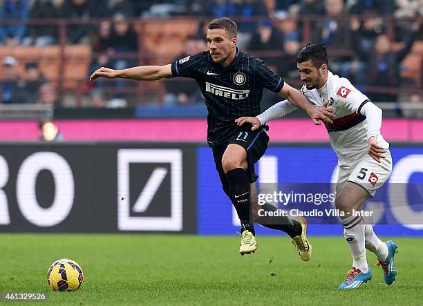 Lukas Podolski of FC Internazionale in action during the Serie A match between FC Internazionale Milano and Genoa CFC at Stadio Giuseppe Meazza on...