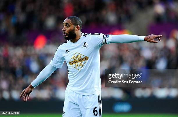 Ashley Williams of Swansea in action during the Barclays Premier League match between Swansea City and West Ham United at Liberty Stadium on January...