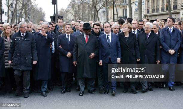 French President Francois Hollande is surrounded by head of states including European Commission President European Commission President Jean-Claude...