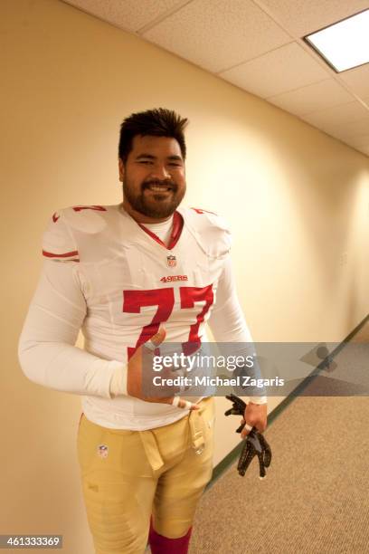 Mike Iupati of the San Francisco 49ers stands in the locker room prior to the game against the Green Bay Packers at Lambeau Field on January 5, 2014...